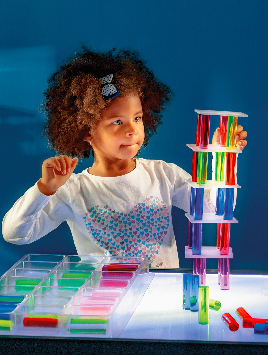 Luxy Regenbogen- Säulen im Holzkasten Luxy Regenbogen- Säulen im Holzkasten